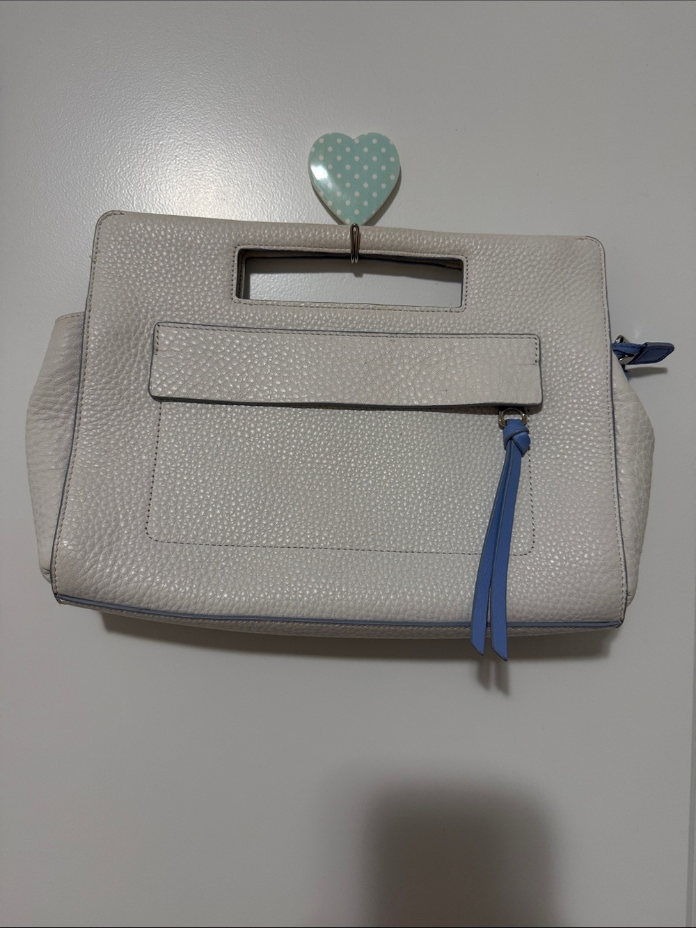 Coach vtg White Pebbled Leather Cutout-Handle Clutch with Light Blue Zip Accent